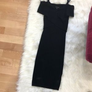 Stretchy sweater like fabric black fitted dress